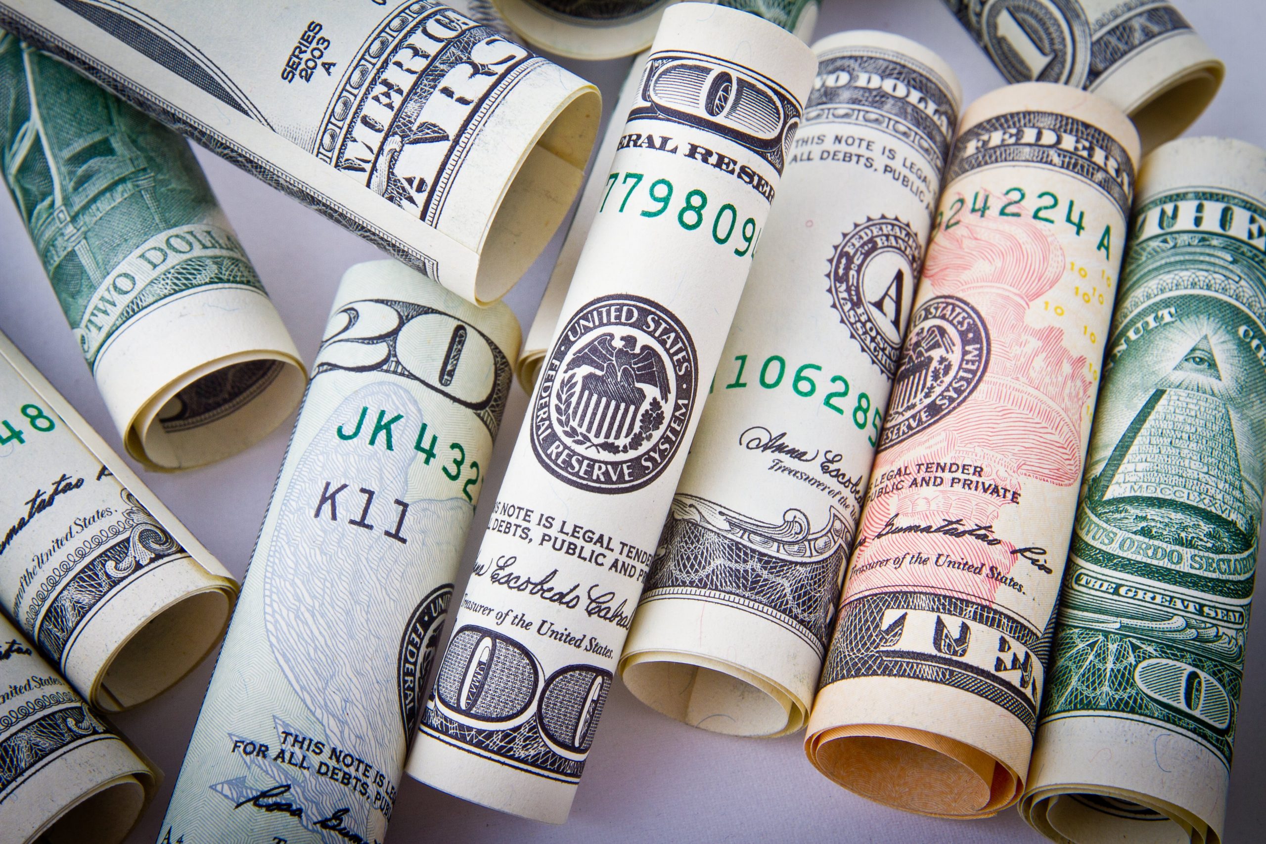 Rolls of $5, $10 and $20 dollar bills